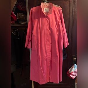 Late 80s / early 90s vintage pink trench coat.  Excellent condition.
